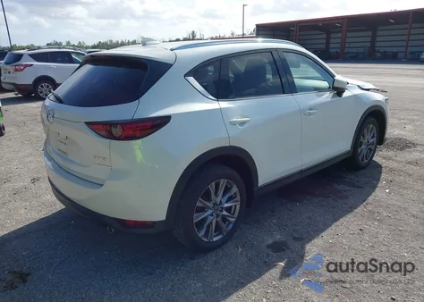 2020 Mazda Cx-5 Grand Touring z USA, uszkodzony, nr VIN JM3KFADM5L0809046